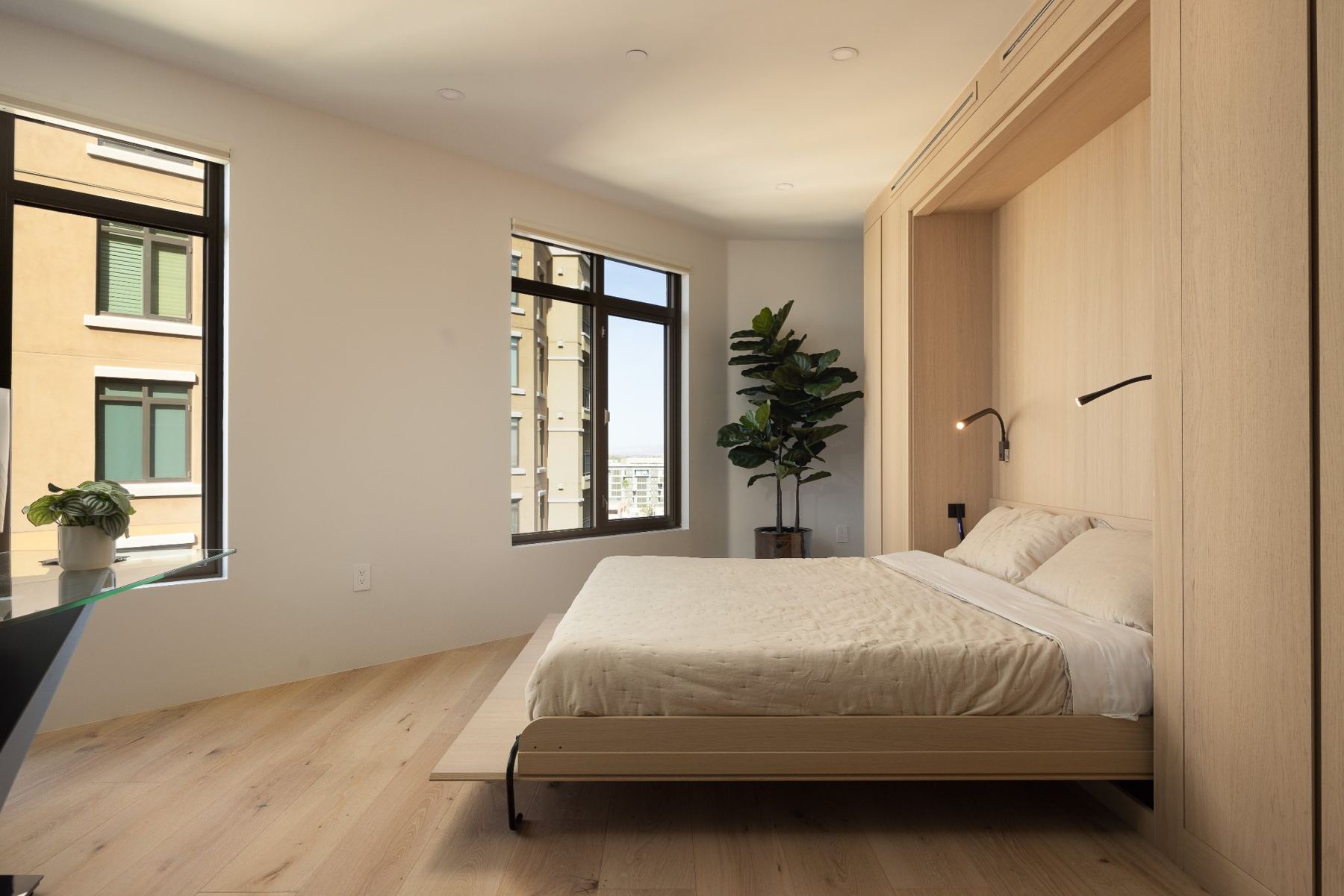Bedroom with corner windows