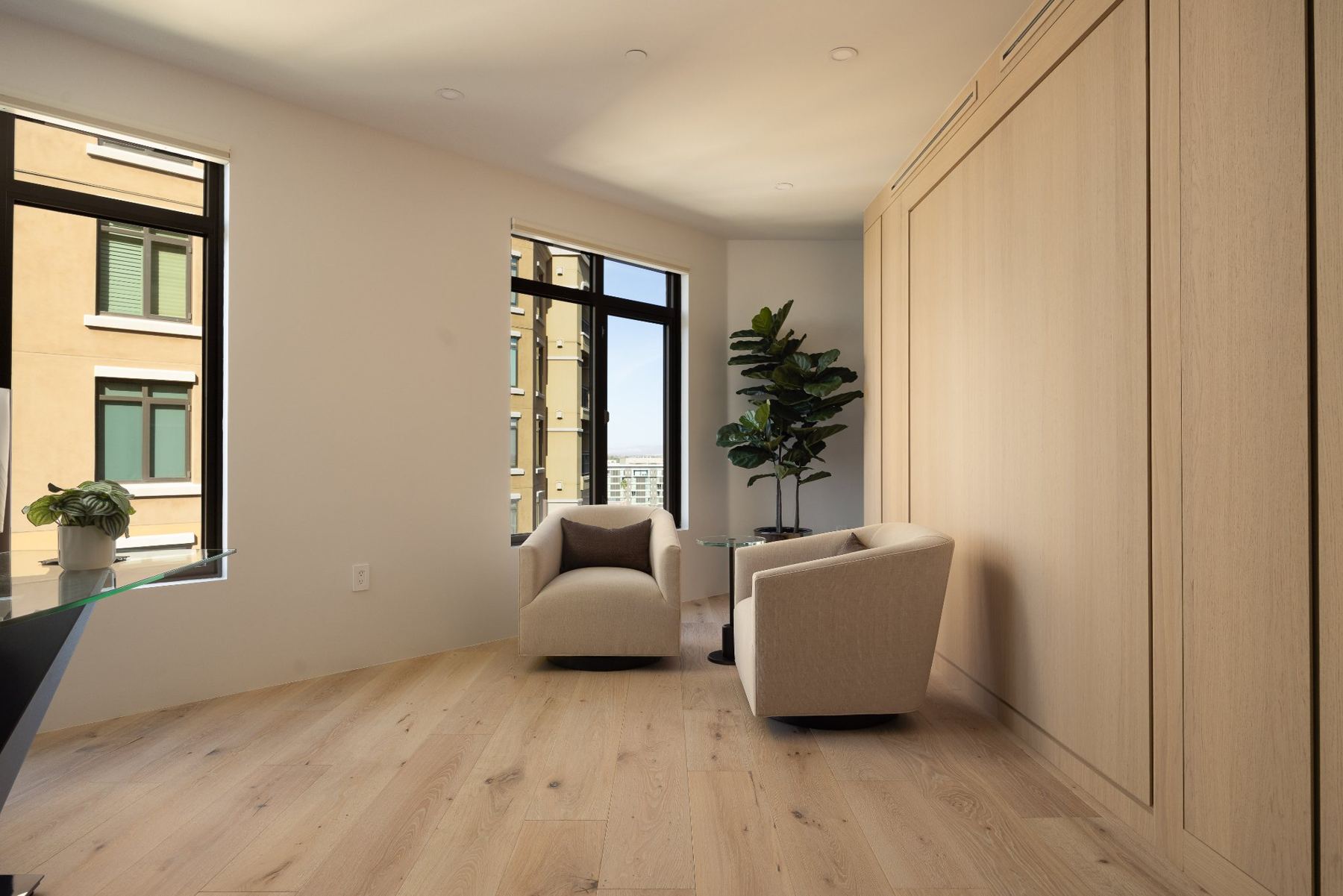 Sitting area by the corner windows