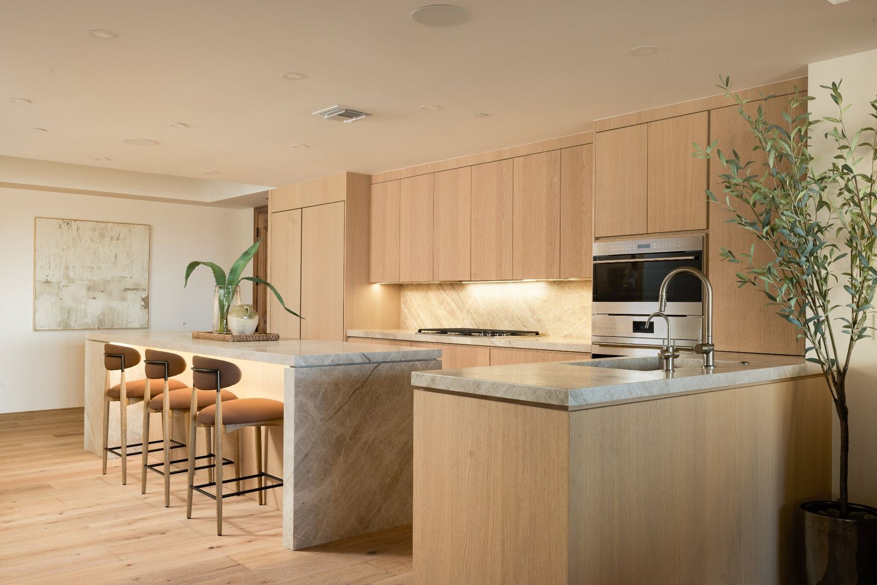 Kitchen with waterfall island & bar seating
