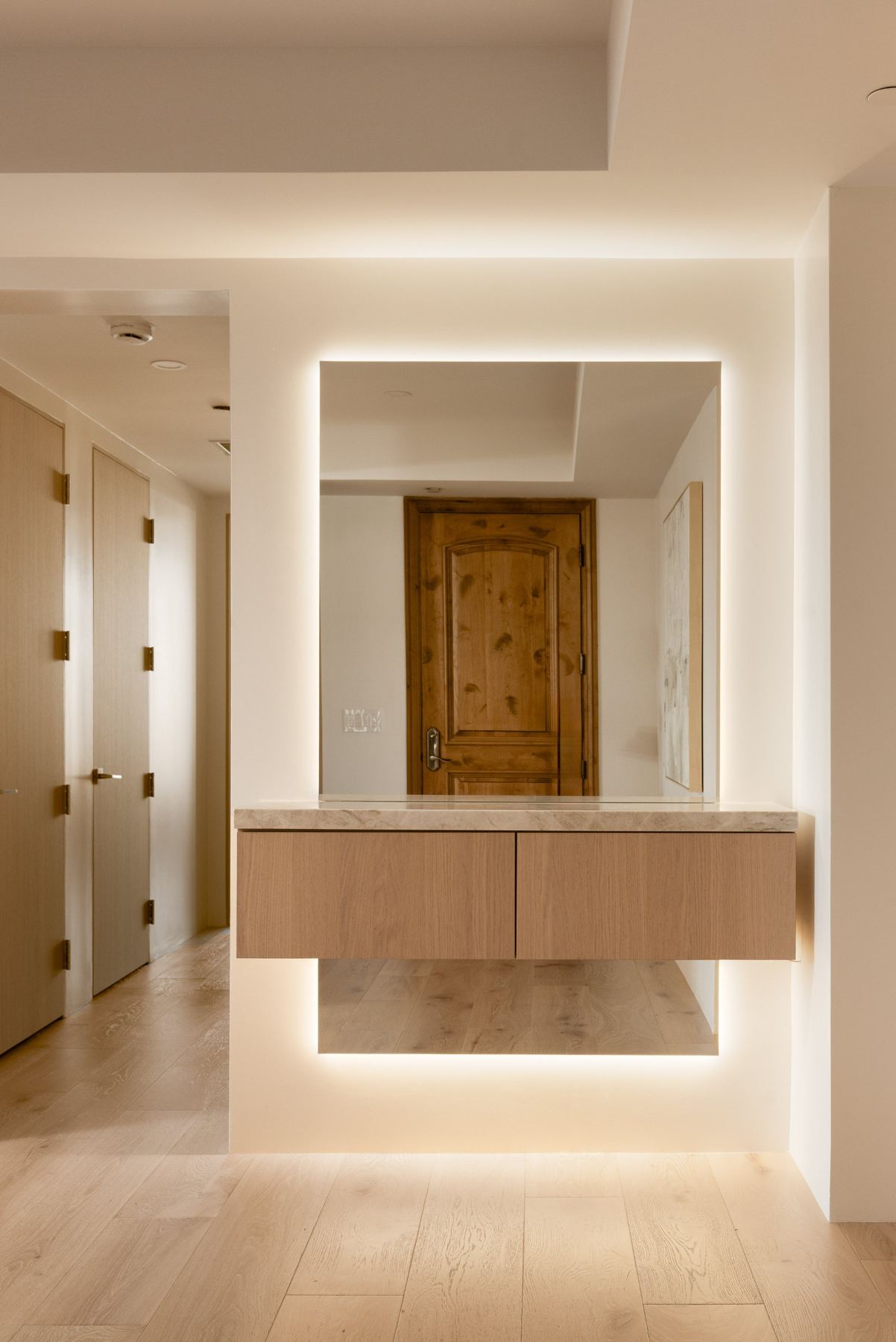 Entry with floating lit console